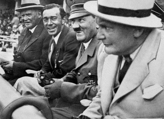 Adolf Hitler at the VIP tribune during the summer Olympic games in Berlin with Hermann Göring and Swedish Prince Gustaf Adolf